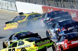 Drivers collected in the final caution of Saturday were Clint Bowyer, Denny Hamlin, Kasey Kahne, Chad McCumbee, Trevor Bayne, Brendan Gaughan, Mike Bliss, Greg Biffle and Paul Menard. Credit: Jeff Zelevansky/Getty Images for NASCAR